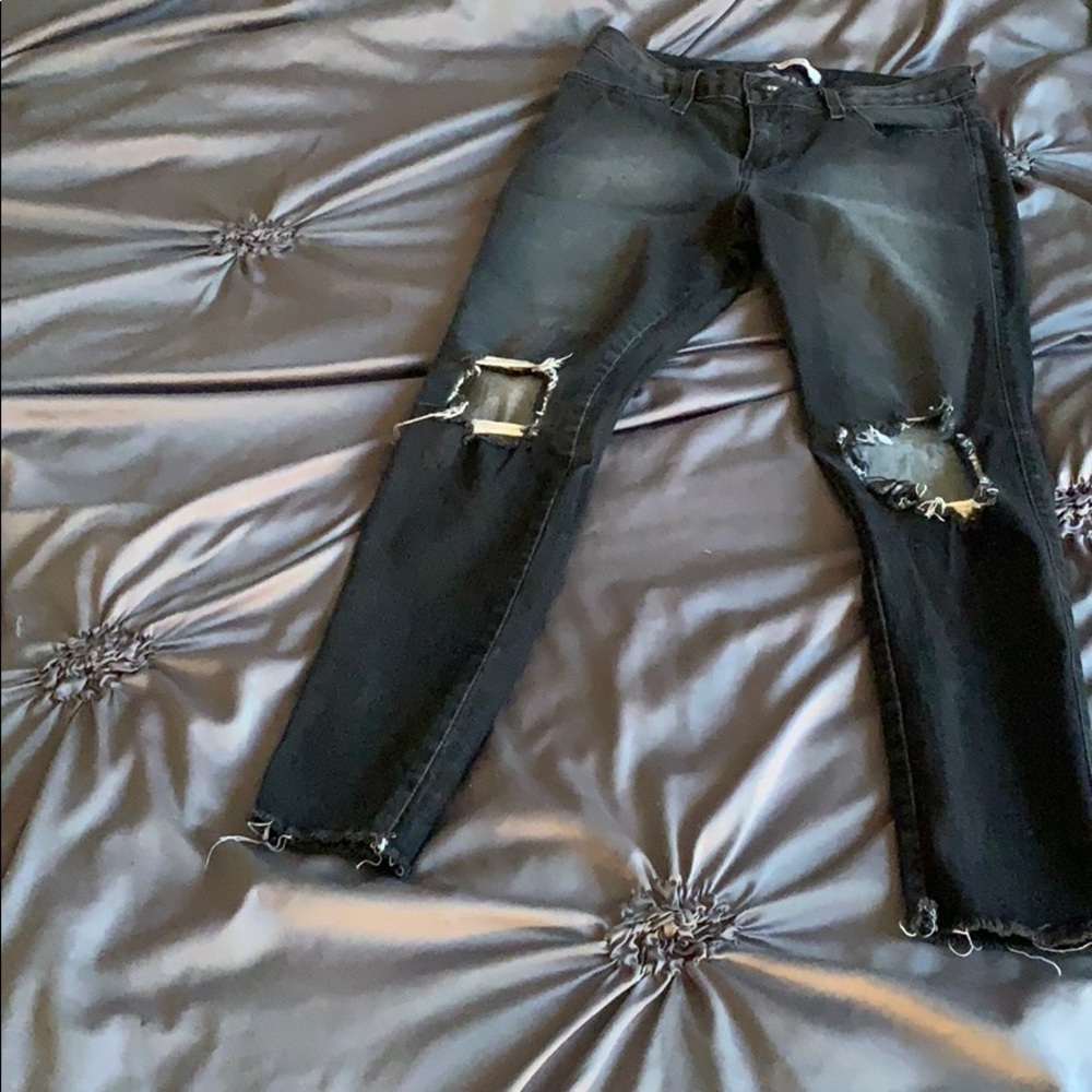 Black washed blue jeans, with rips!